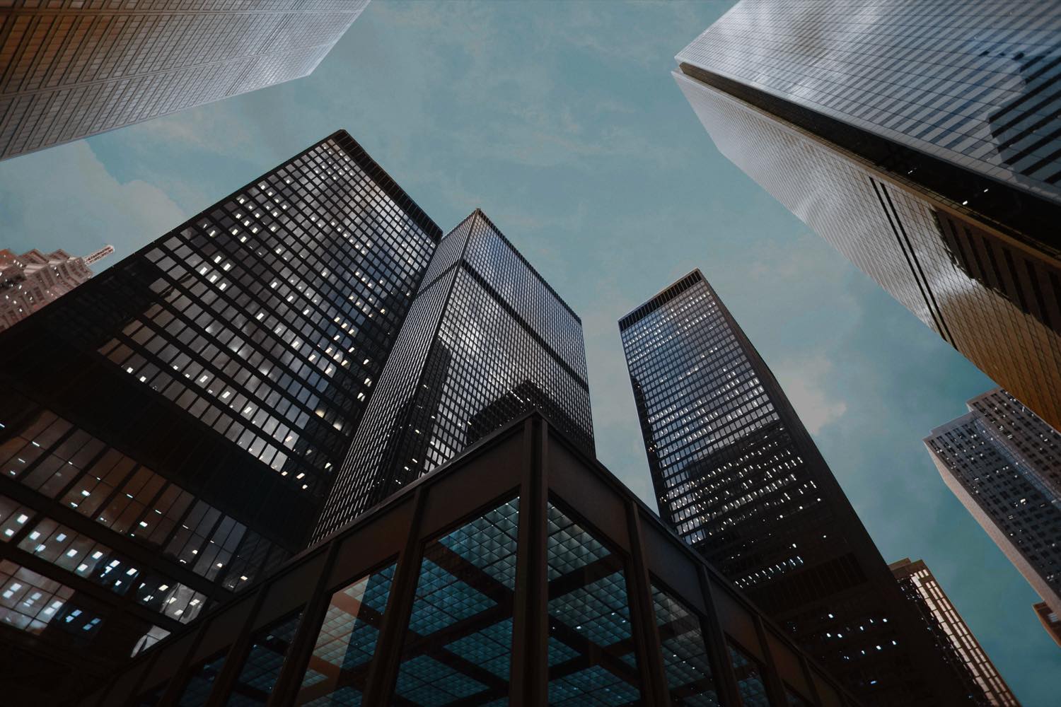 Executive commercial office towers photographed from street level — the premises Meridian Facilities Group maintains